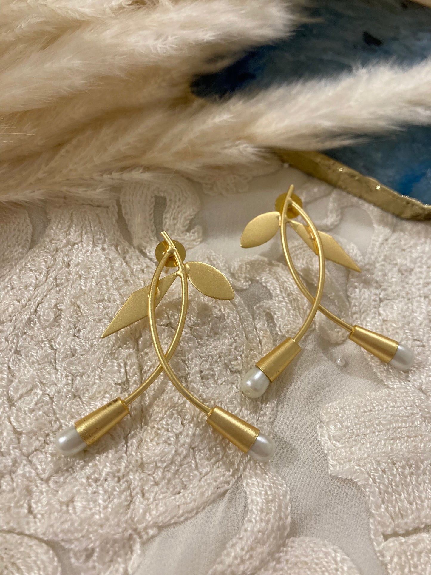 Floral Inspired golden earrings with pearls
