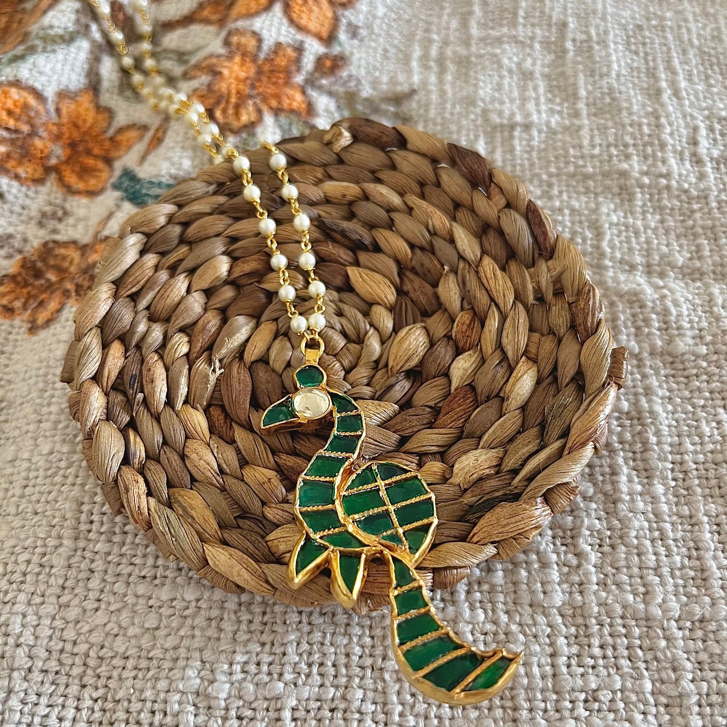 Pachi Kundan peacock pendant with pearl string in silver and alloy