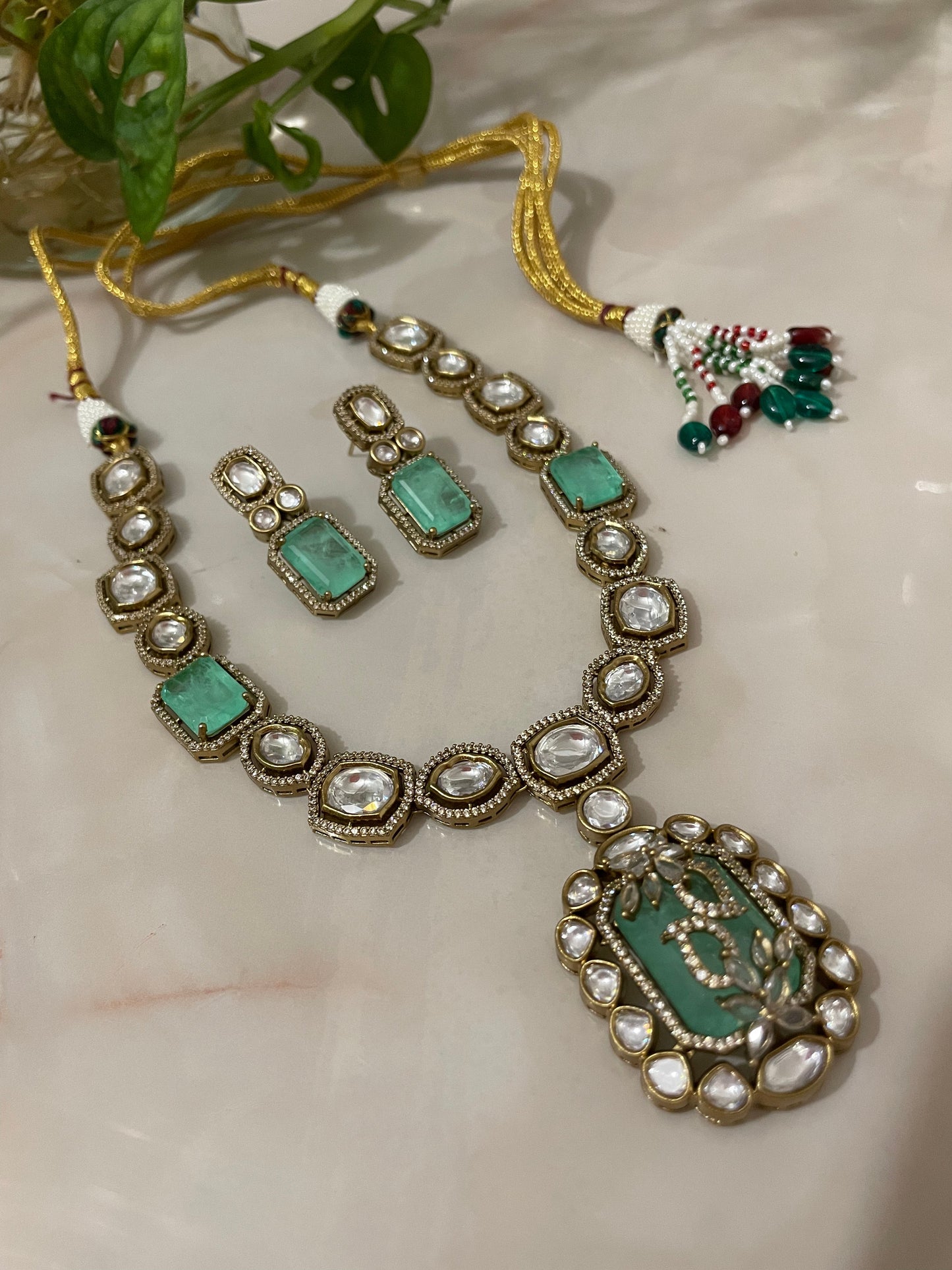 Emerald green necklace set with Kundan