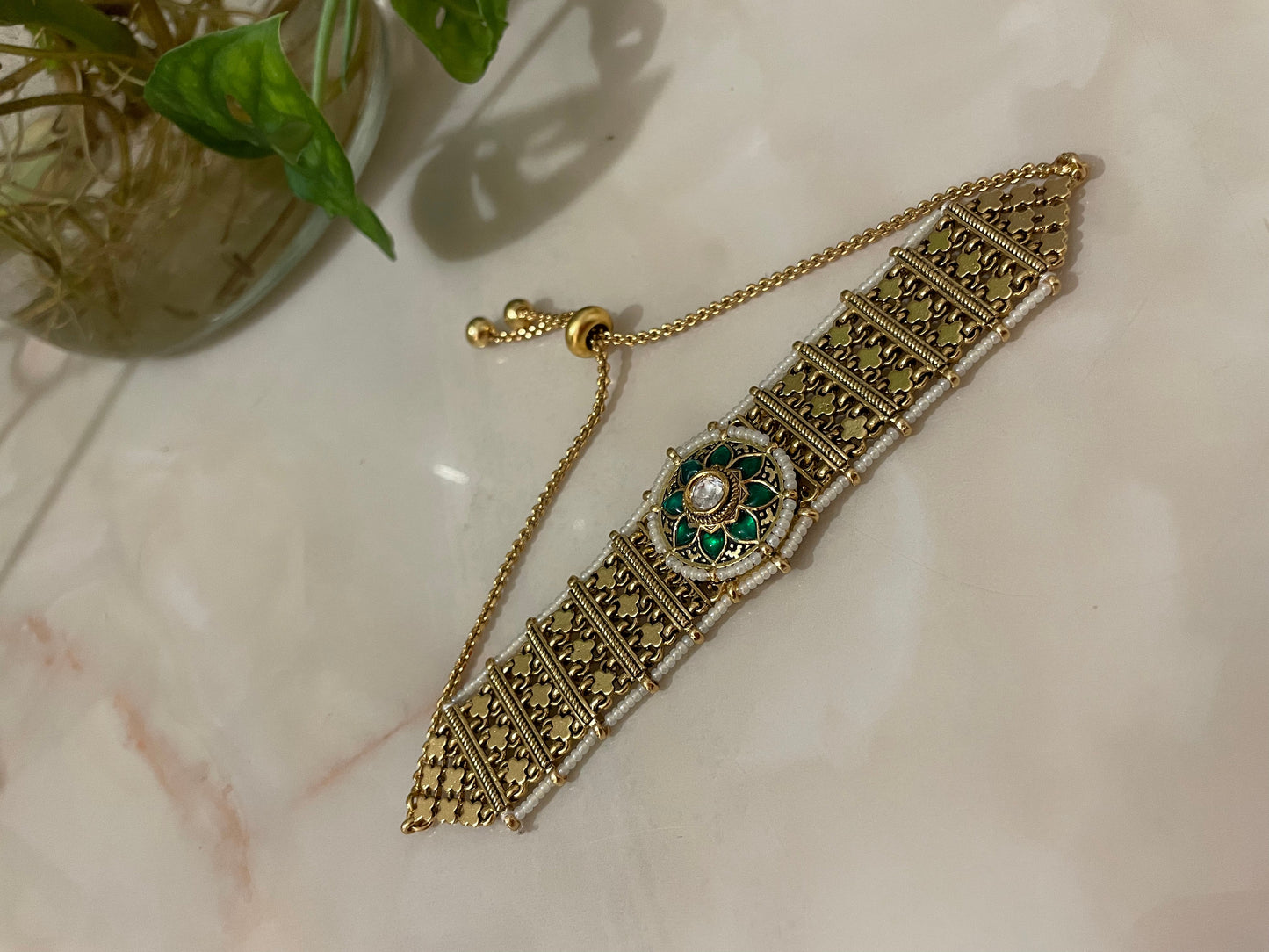 Gold bracelet with Pearls & Emerald green semi precious stones