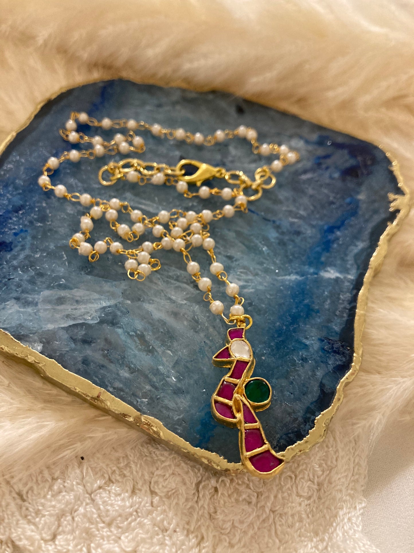 Pachi Kundan peacock pendant with pearl string in silver and alloy