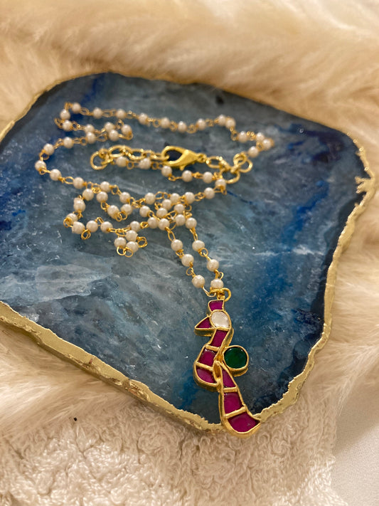 Pachi Kundan peacock pendant with pearl string in silver and alloy