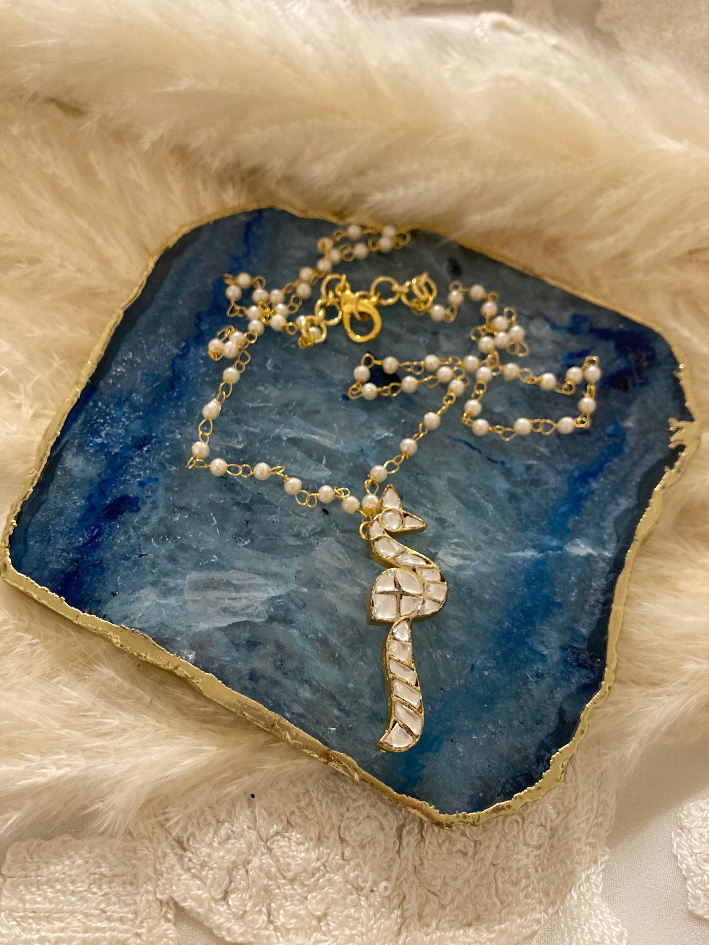 Pachi Kundan peacock pendant with pearl string in silver and alloy