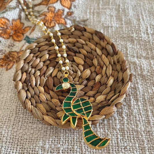 Pachi Kundan peacock pendant with pearl string in silver and alloy