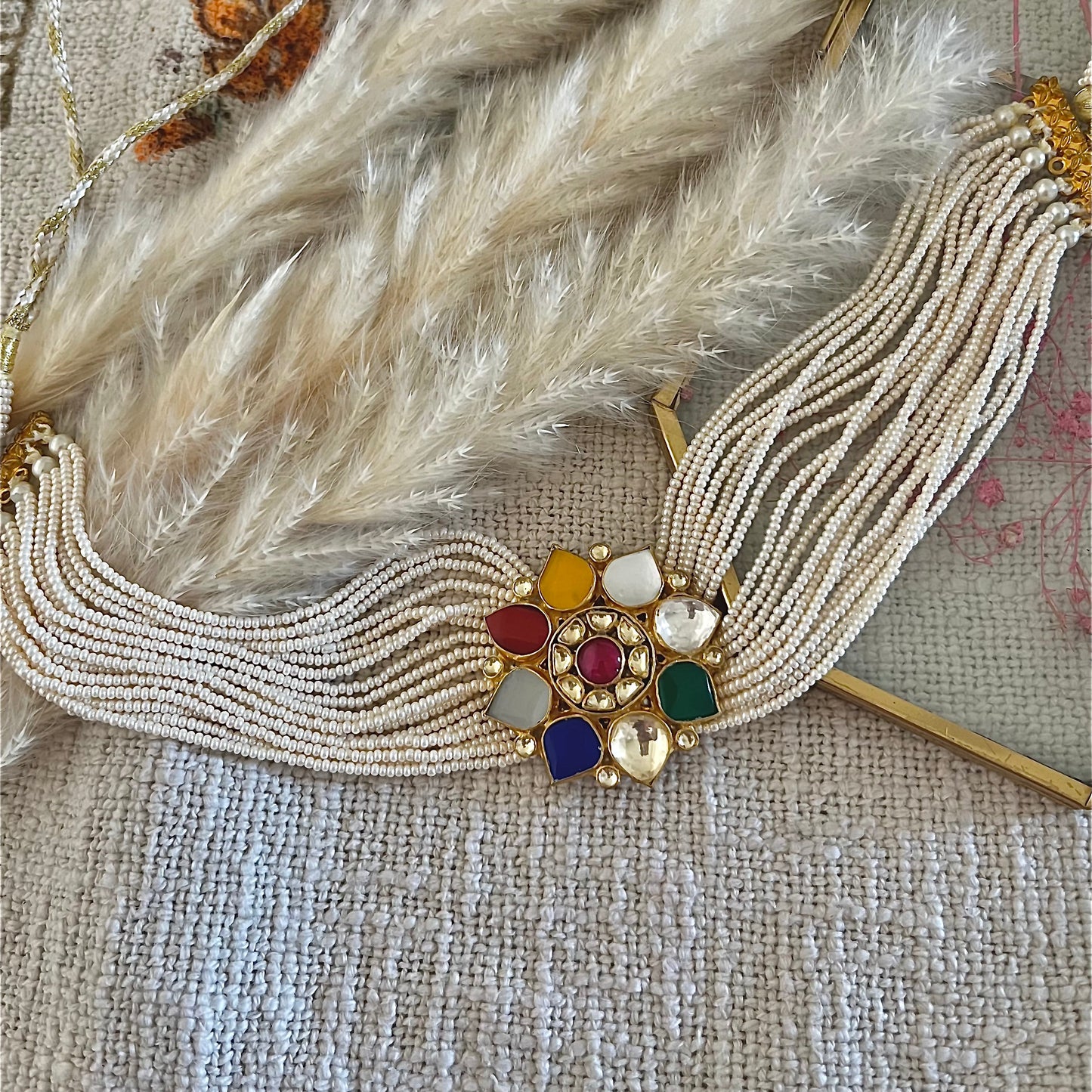 Pachi Kundan Navratan choker with pearl strings in silver and alloy