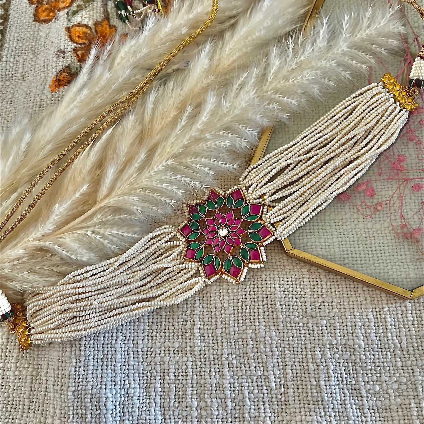 Floral Pachi Kundan choker with pearl strings in silver and alloy